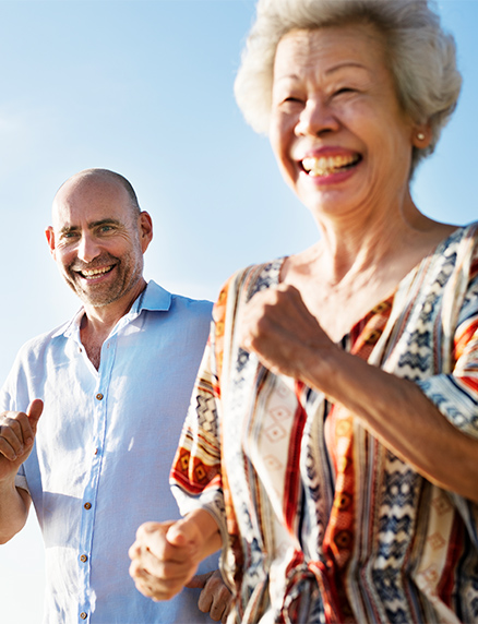 Smiling Senior Couple Running Tax Free Retirement San Diego CA